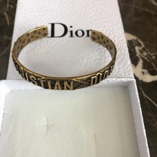 Dior-logopatroon messing manchetarmband Prijs