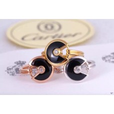 Amulette de Cartier zwarte onyxring met diamant in geel goud, wit goud en roze goud