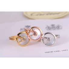 Amulette de Cartier witte parelmoerring met diamant in geelgoud, witgoud en roze goud