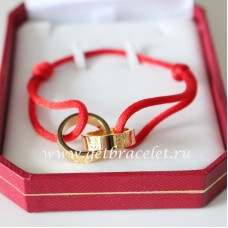 Cartier dubbele ring liefdesarmband geel goud rood touw