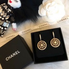 Christian Dior opengewerkte messing bloemhanger dames diamanten kompas hoepeloorbellen