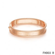 Van Cleef en Arpels Perlee-handtekening in roze gouden armband-medium model