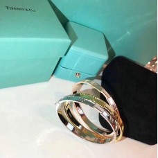 Tiffany Atlas dames gesloten scharnierende zilverroze / geelgouden armbandkristallen