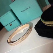 Tiffany T twee dunne scharnierende kloonkristallen armband zilver roze/geel goud voor dames
