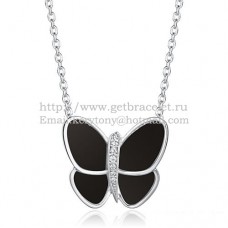 Van Cleef Arpels vliegende vlinder hanger ketting wit goud met zwarte onyx diamanten